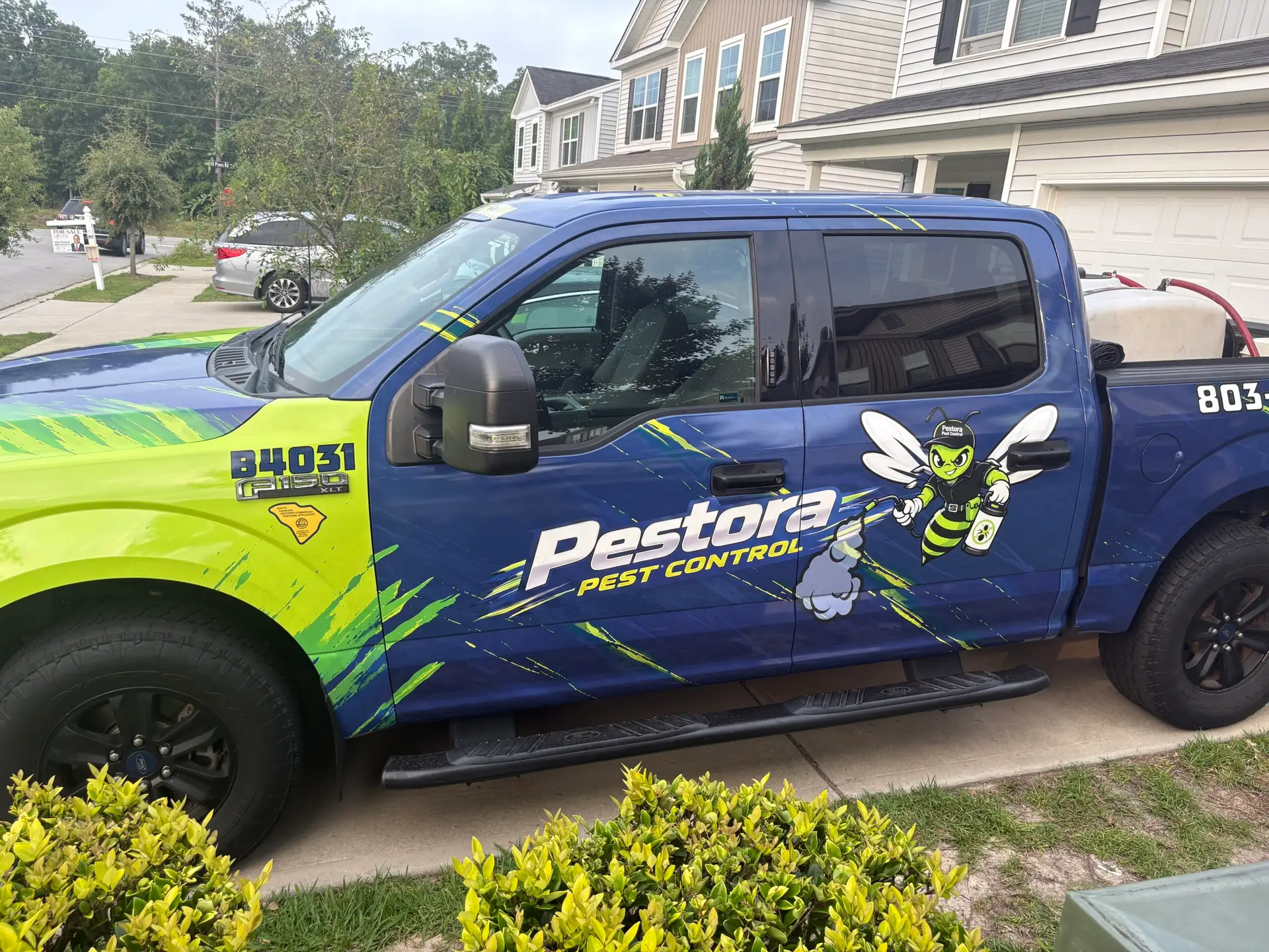 Pestora Pest Control service truck parked outside a Blythewood, SC home